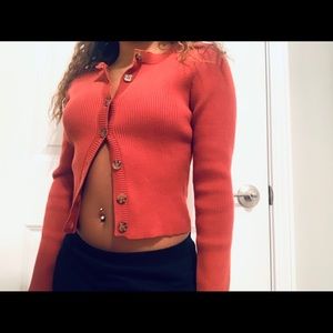 burnt orange button down sweater